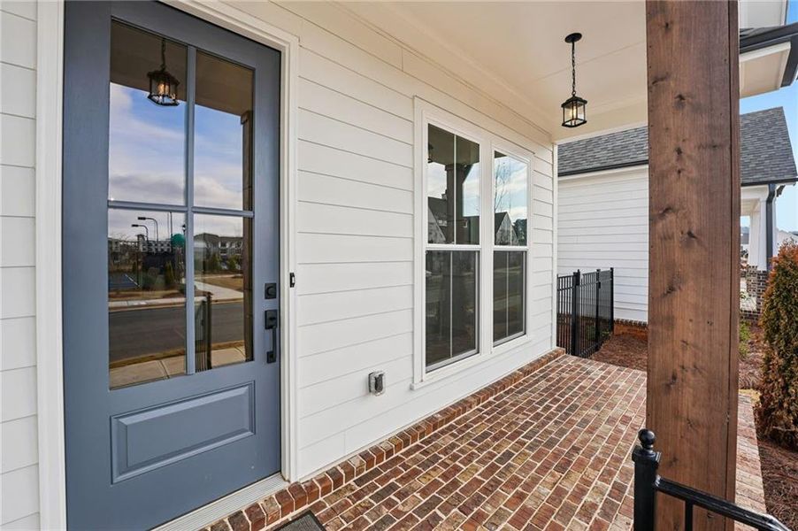 Exterior details and patio area of a home in Promenade at Sawnee Village, Cumming (Image 4).