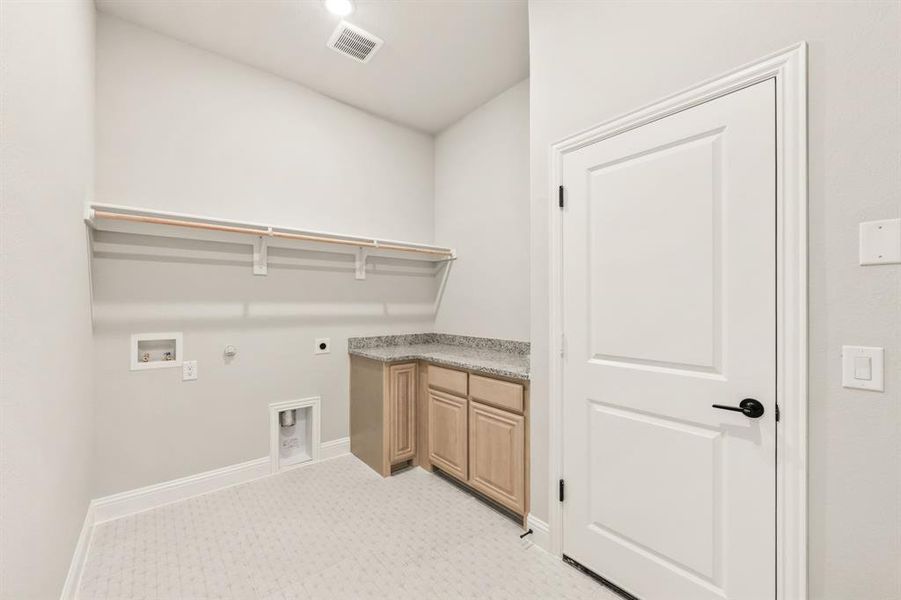 Furnished interior view inside a new home in Mockingbird Hills 60-65, Joshua (Image 11).