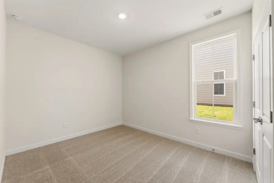 Spacious, unfurnished interior of a new home in Cottages at Lake Emory, Inman (Image 26).