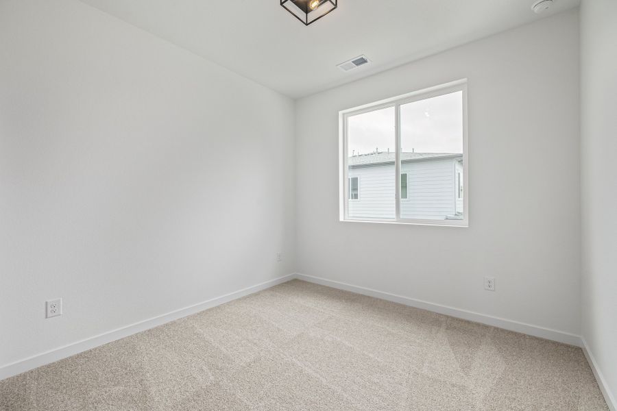 Spacious, unfurnished interior of a new home in Painted Prairie, Aurora (Image 31).