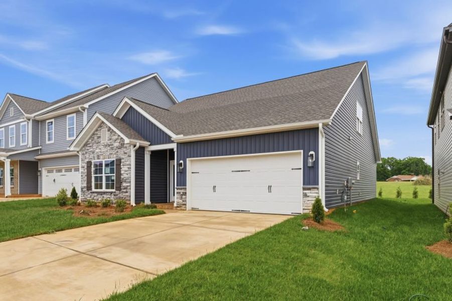 Front exterior of a new home in Sullivans Reserve, Walkertown, NC, highlighting curb appeal (Image 30).
