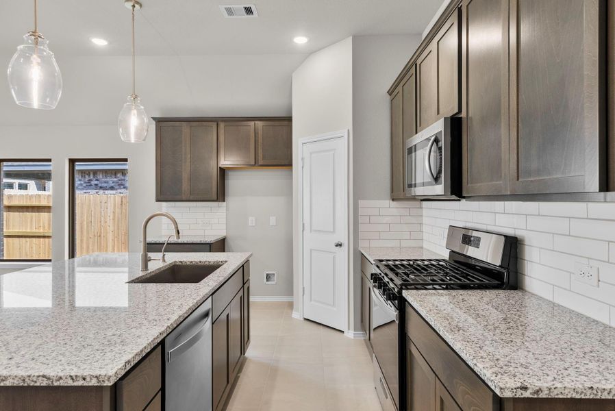 Furnished interior view inside a new home in Grand Central Park, Conroe (Image 7).