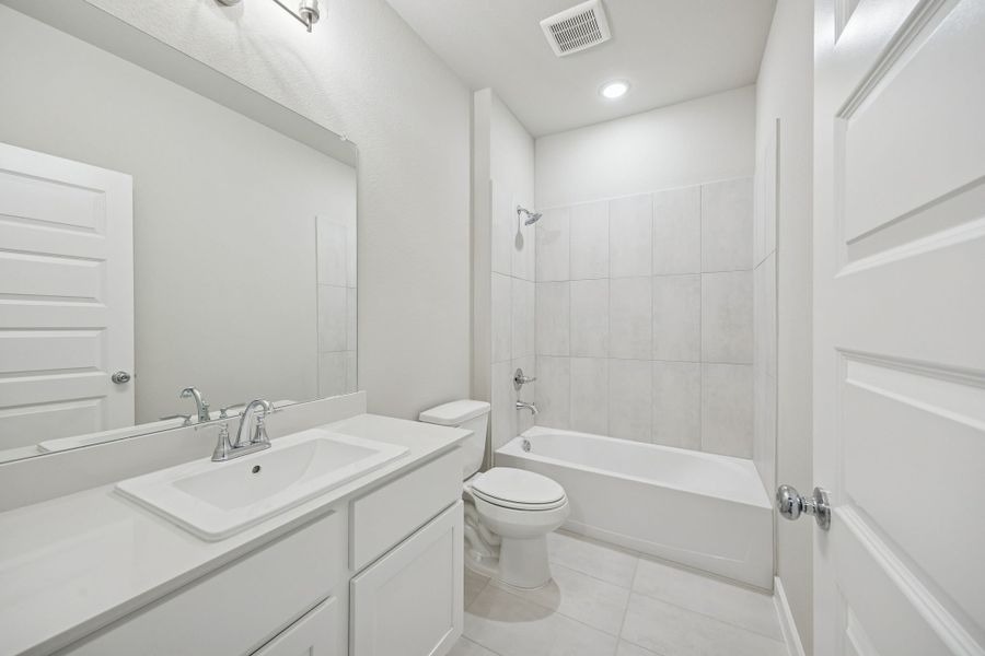 Bathroom in the Stanley II home plan by Trophy Signature Homes – REPRESENTATIVE PHOTO Bathroom in the Stanley II home plan by Trophy Signature Homes – REPRESENTATIVE PHOTO