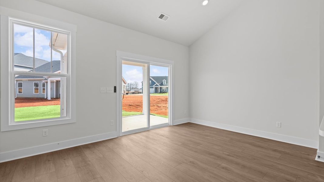 This eye-catching breakfast area provides a comfortable and stylish setting for daily meals.