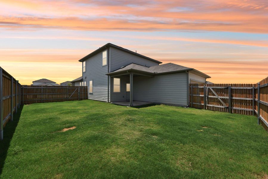 Exterior details and patio area of a home in Stonewall Ranch, Liberty Hill (Image 28).