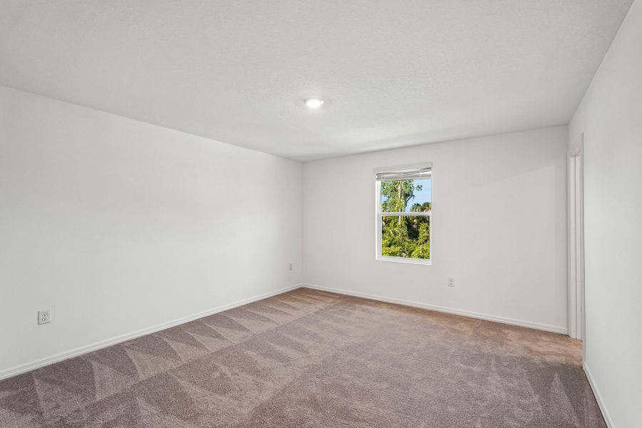 Spacious, unfurnished interior of a new home in The Towns at Tiburon, Nokomis (Image 10).