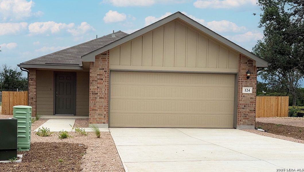Front exterior of a new home in High Garden, Comfort, TX, highlighting curb appeal (Image 1). Front exterior of a new home in High Garden, Comfort, TX, highlighting curb appeal (Image 1).