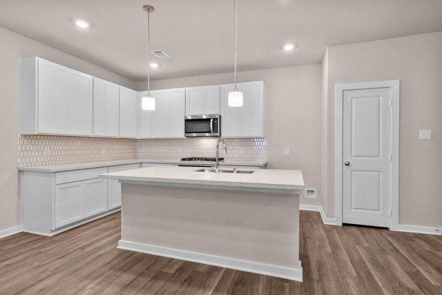 Furnished interior view inside a new home in Westridge Cove, Conroe (Image 7).