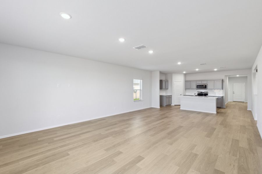 Open First Floor in the Holden home plan by Trophy Signature Homes – REPRESENTATIVE PHOTO Open First Floor in the Holden home plan by Trophy Signature Homes – REPRESENTATIVE PHOTO