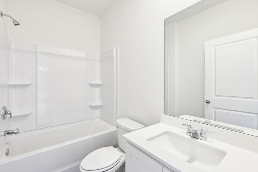 Furnished interior view inside a new home in Sunterra Lakes, Brookshire (Image 4).