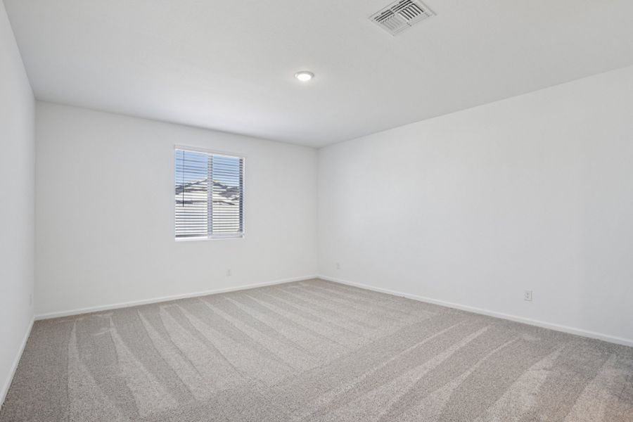 Primary suite - Sanctuary at Stonebridge Model Home. Finishes and options may vary by community