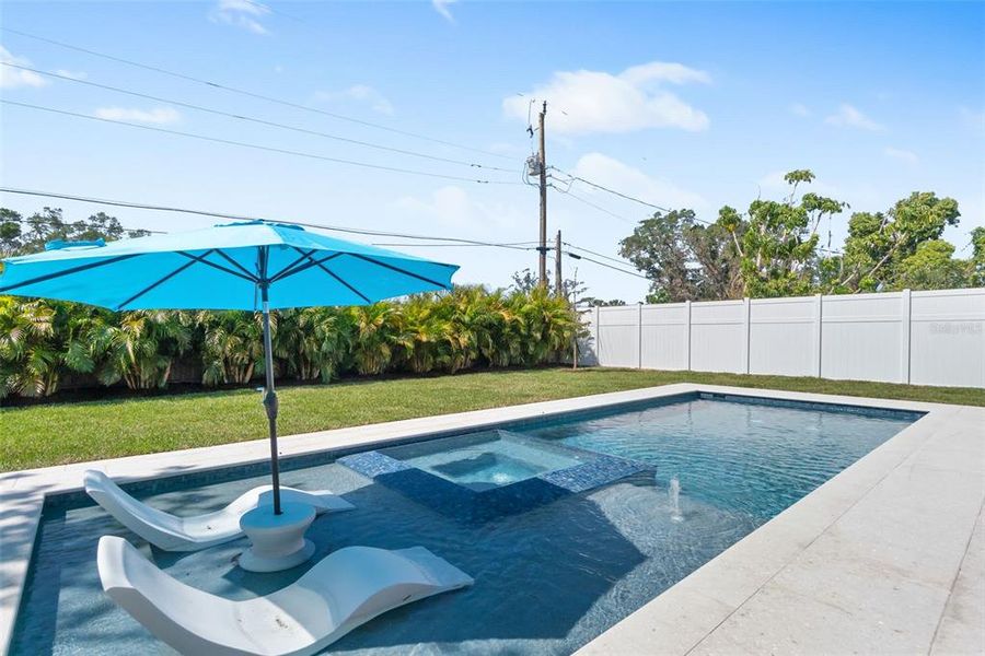 Front exterior of a new home in , Sarasota, FL, highlighting curb appeal (Image 28).