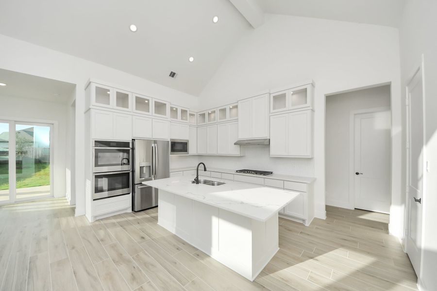 Furnished interior view inside a new home in Meridiana, Manvel (Image 8).