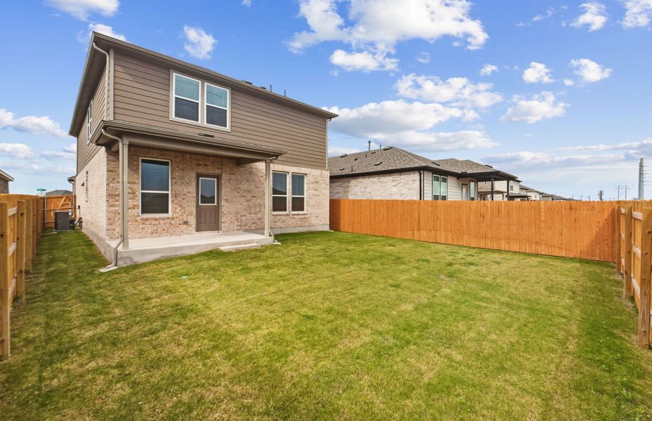 Exterior details and patio area of a home in Crosswinds, Kyle (Image 24).
