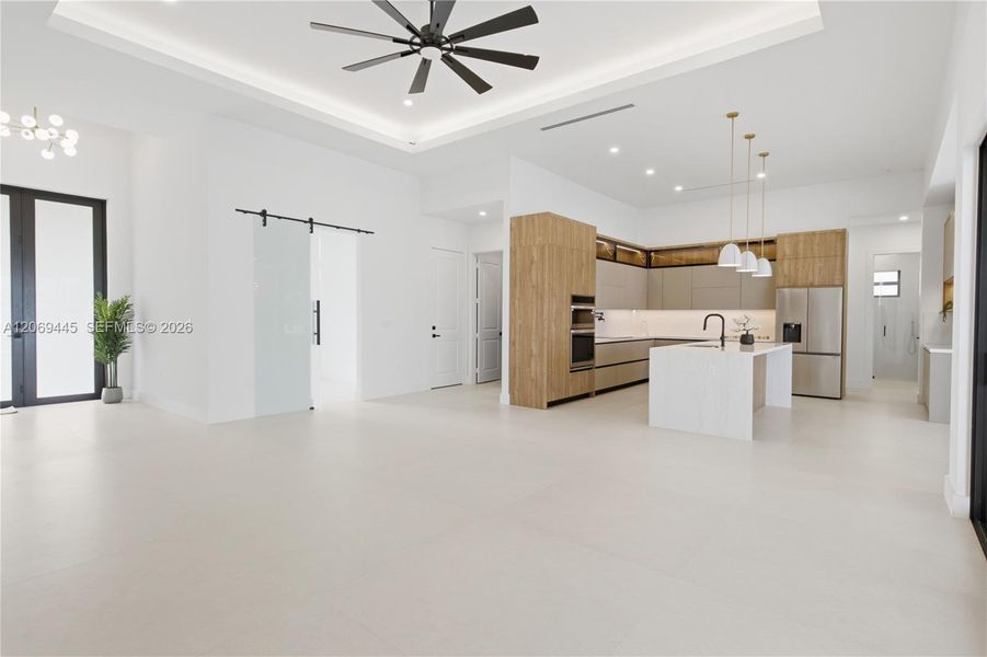 Large-format tile flooring and contemporary finishes create a clean, sophisticated atmosphere. Large-format tile flooring and contemporary finishes create a clean, sophisticated atmosphere.