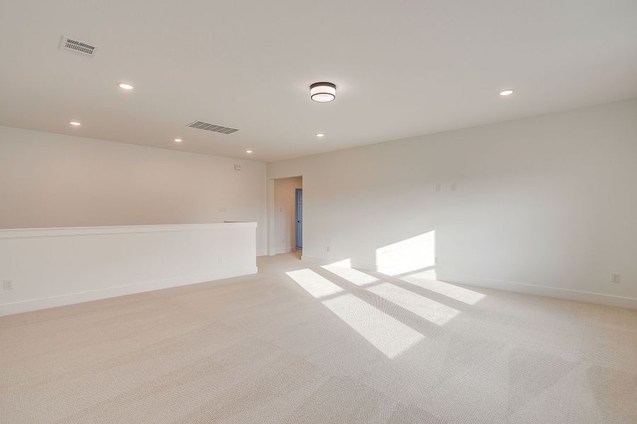Representative unfurnished interior of a home built from the Valera by Graham Hart Home Builder in Bear Ridge, Burleson (Image 20).