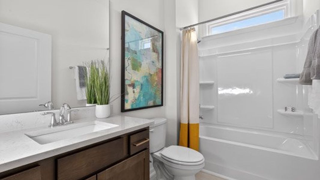 Representative furnished interior of a home built from the Azalea by D.R. Horton in The Villas at Galvins Ridge, Sanford (Image 18).