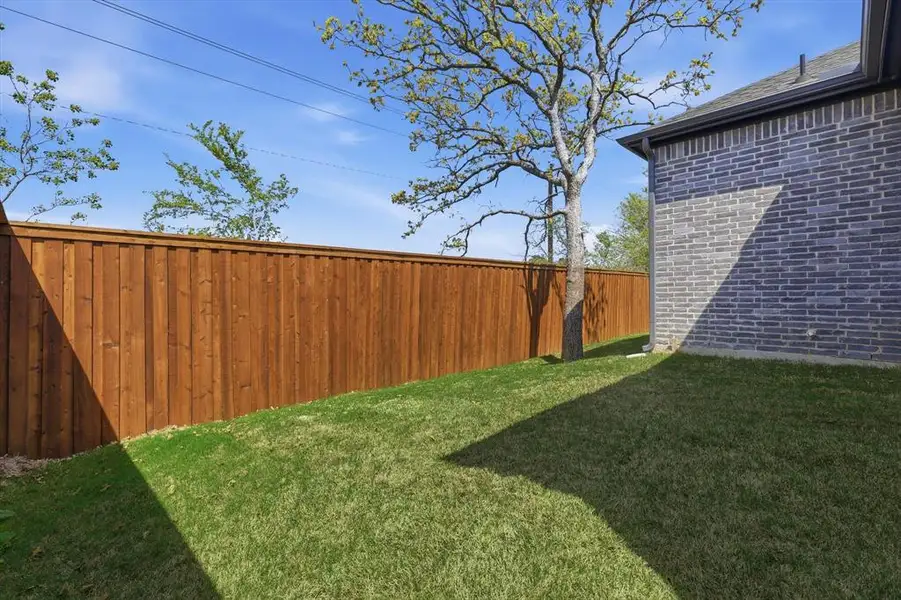 Exterior details and patio area of a home in , Denton (Image 3).