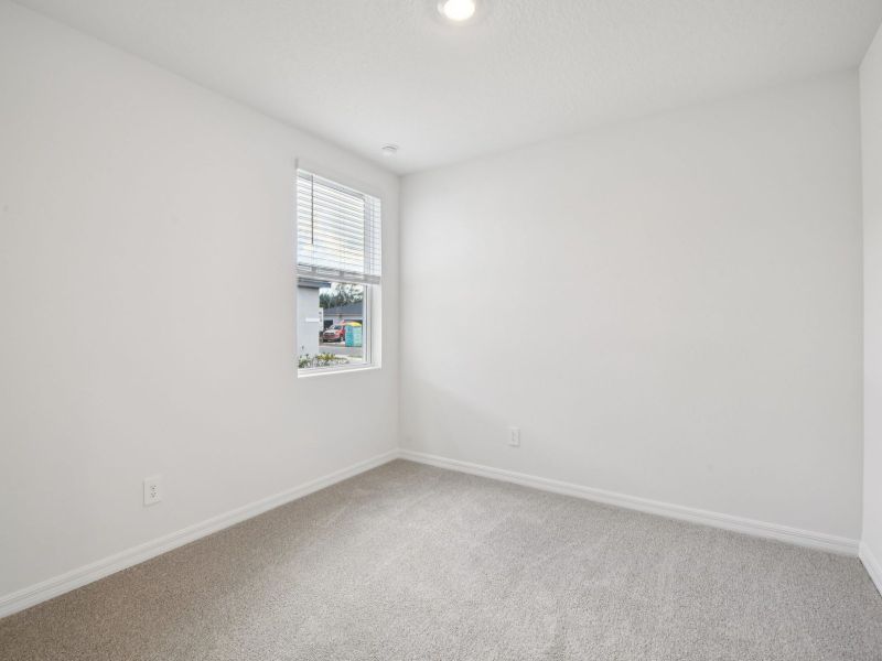 Spacious, unfurnished interior of a new home in Ridgehaven - Villas, Ormond Beach (Image 10).