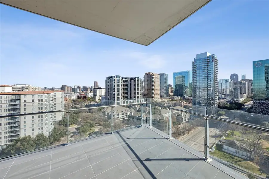 Condo located in Dallas, TX showcasing its design and architecture (Image 2). Condo located in Dallas, TX showcasing its design and architecture (Image 2).