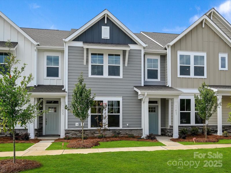 Front exterior of a new home in North Creek Village - Townhomes, Huntersville, NC, highlighting curb appeal (Image 2).