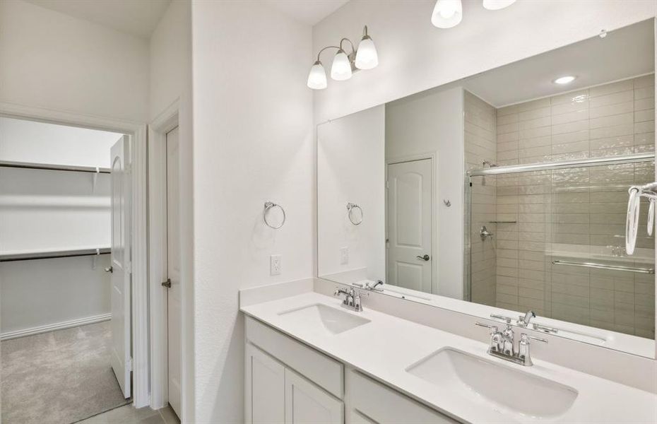 Owner's bath with dual vanity and oversized shower*real home pictured *real home pictured