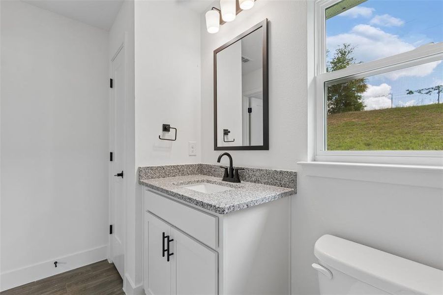 Furnished interior view inside a new home in Abbey Glen, Dade City (Image 10).