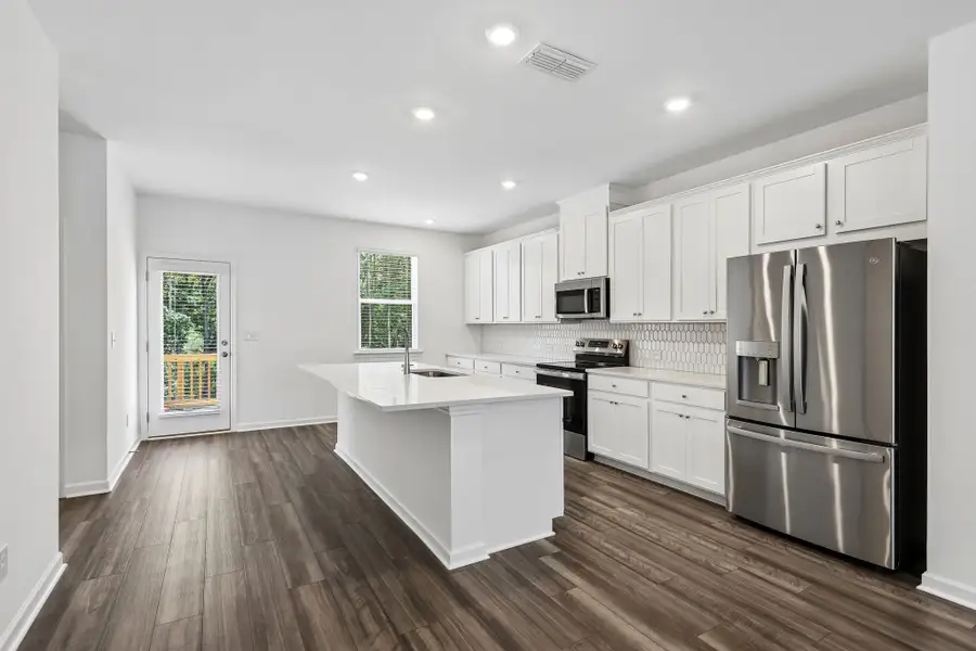 Furnished interior view inside a new home in Alder Creek, Cumming (Image 6).