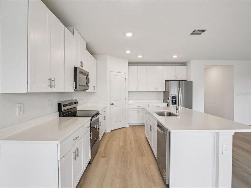 Furnished interior view inside a new home in Oakfield Trails - Classic Series, Parrish (Image 4).