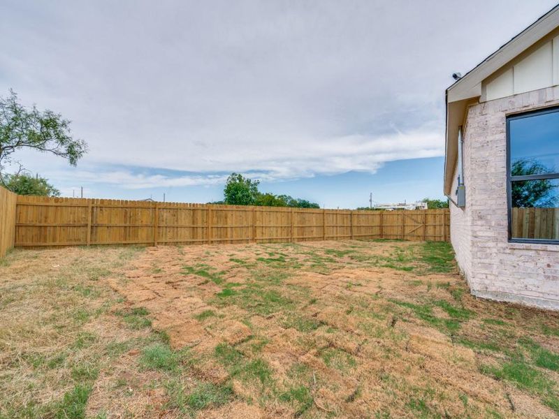 Front exterior of a new home in , De Leon, TX, highlighting curb appeal (Image 16). Front exterior of a new home in , De Leon, TX, highlighting curb appeal (Image 16).