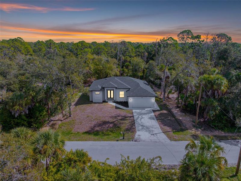 Front exterior of a new home in , Port Charlotte, FL, highlighting curb appeal (Image 2).