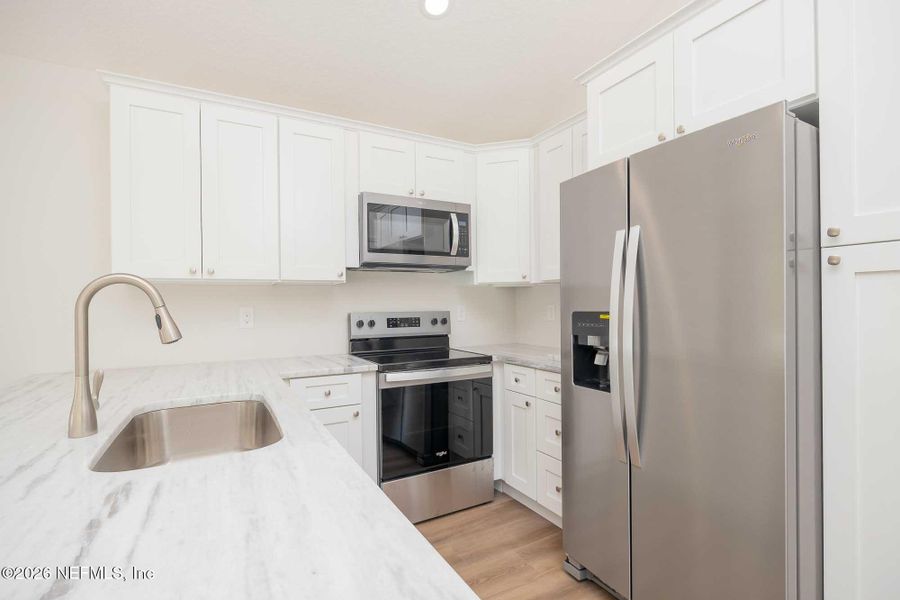 Furnished interior view inside a new home in , St. Augustine (Image 5).