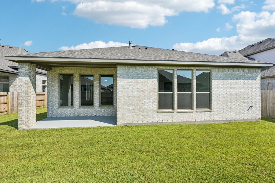Exterior details and patio area of a home in Marvida, Cypress (Image 3).
