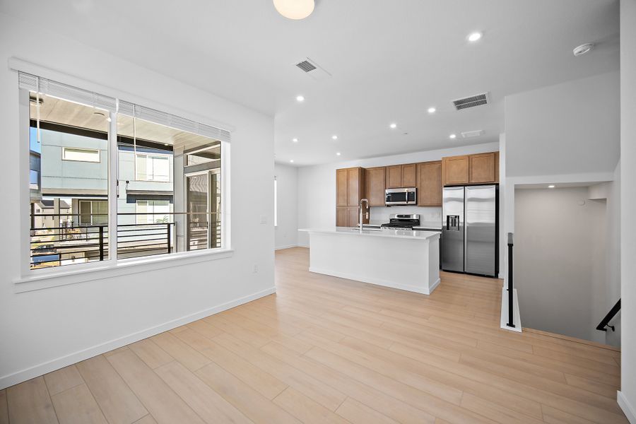 Spacious, unfurnished interior of a new home in Lyric at RidgeGate Townhomes, Lone Tree (Image 15).