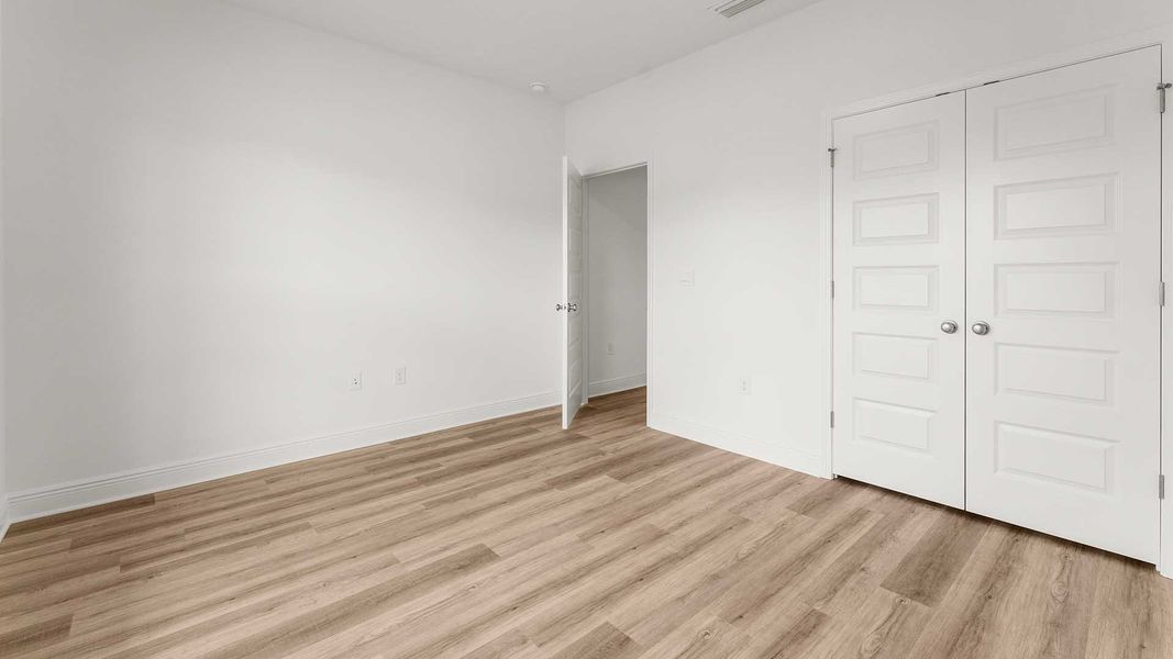 Spacious, unfurnished interior of a new home in Holley Grove at Peach Creek, Santa Rosa Beach (Image 25).