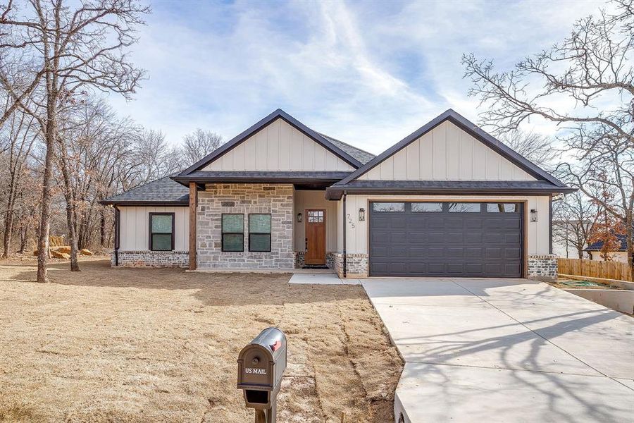 Front exterior of a new home in , Runaway Bay, TX, highlighting curb appeal (Image 2). Front exterior of a new home in , Runaway Bay, TX, highlighting curb appeal (Image 2).