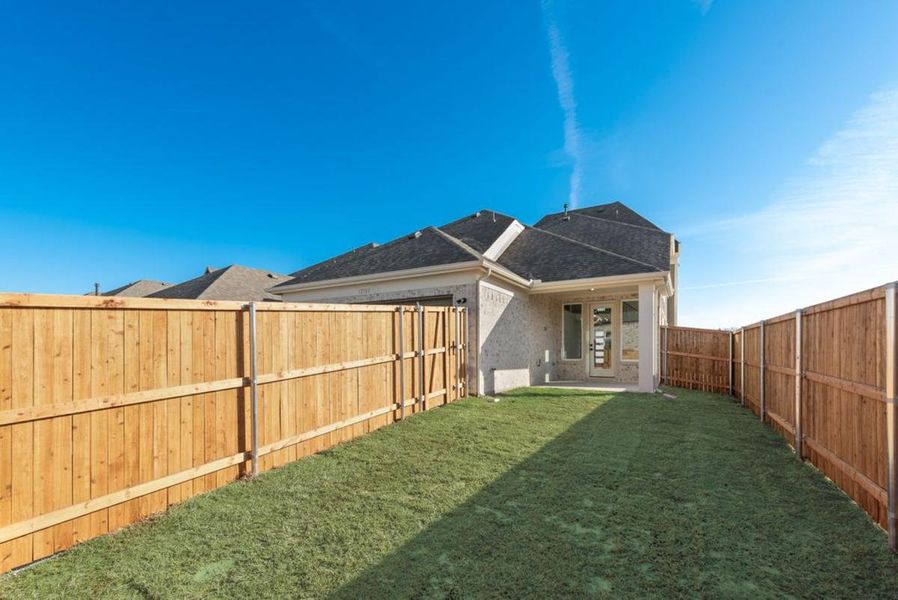 Exterior details and patio area of a home in Trails at Cottonwood Creek, Rowlett (Image 3). Exterior details and patio area of a home in Trails at Cottonwood Creek, Rowlett (Image 3).