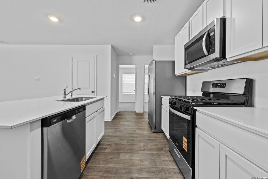 Furnished interior view inside a new home in Avenida, Converse (Image 4).