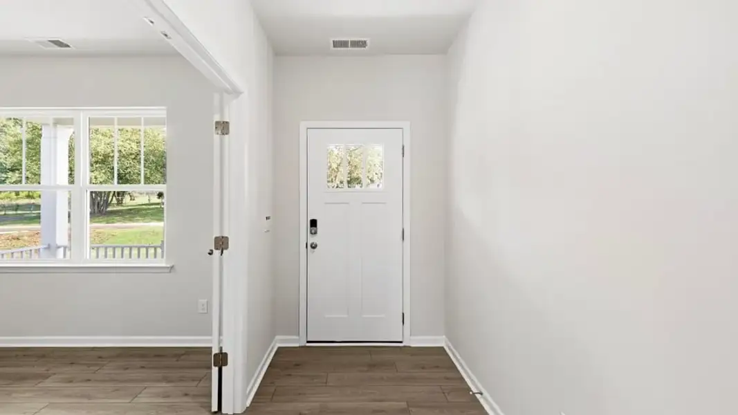 Spacious, unfurnished interior of a new home in Ben Hurt Road, Lyman (Image 16).