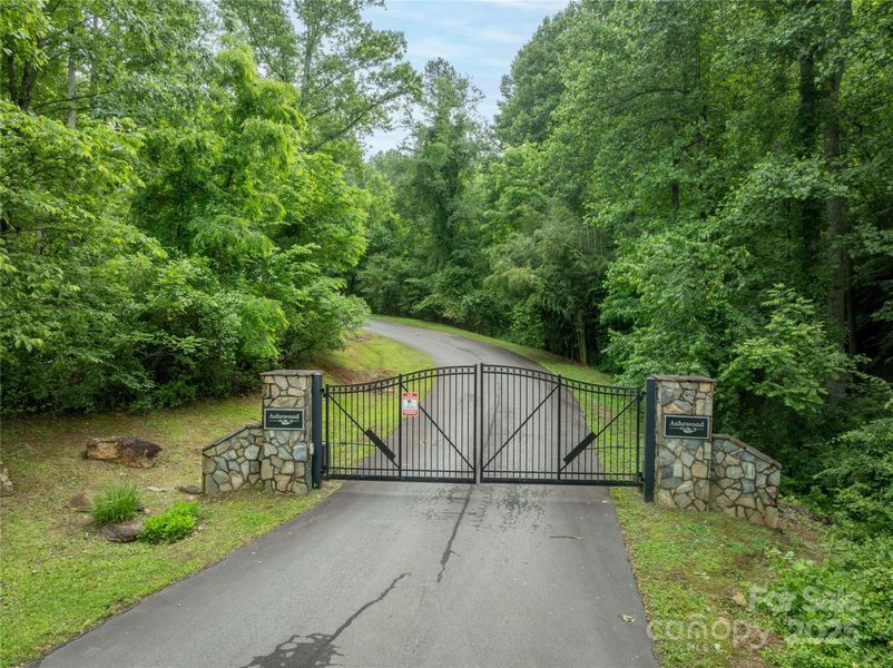 Elegant entry gate with remote and keypad for guests