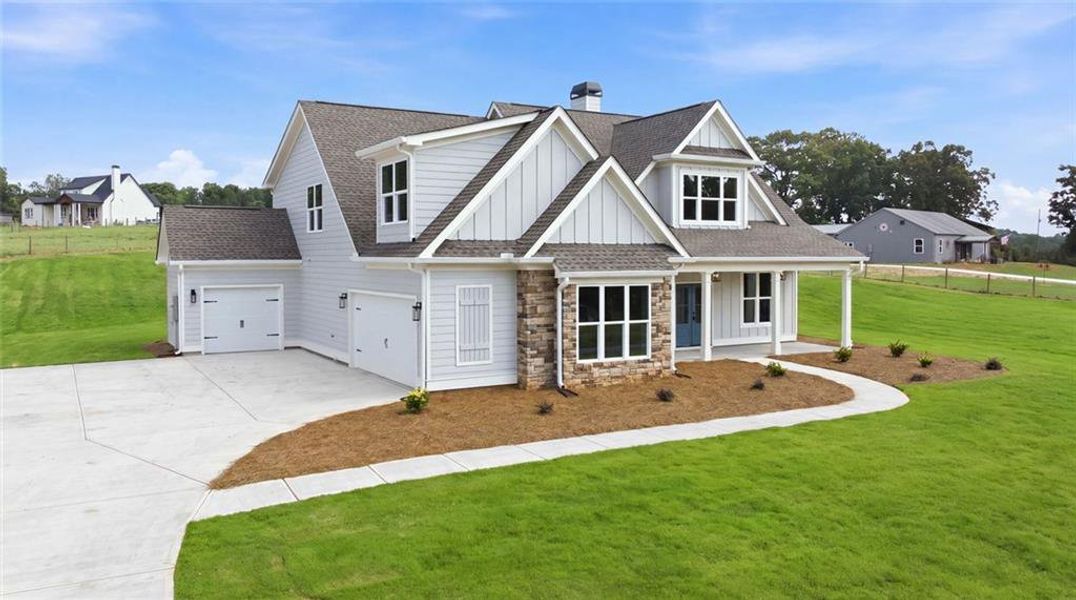 Front exterior of a new home in , Commerce, GA, highlighting curb appeal (Image 25). Front exterior of a new home in , Commerce, GA, highlighting curb appeal (Image 25).