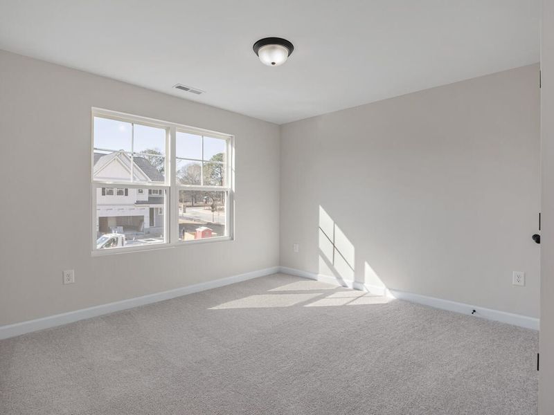 Spacious, unfurnished interior of a new home in Woodland Crossing, Zebulon (Image 22).