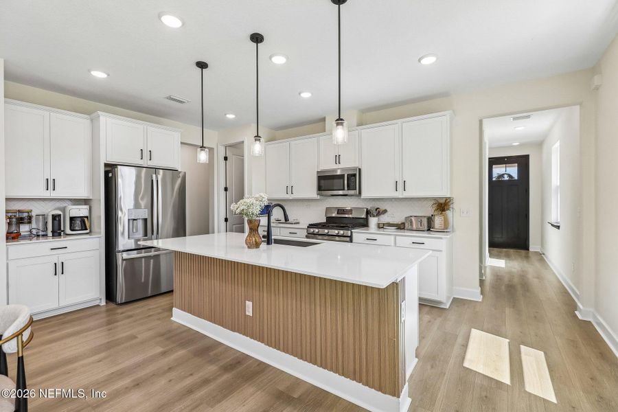 Furnished interior view inside a new home in Seasons at Morada, St. Augustine (Image 6).
