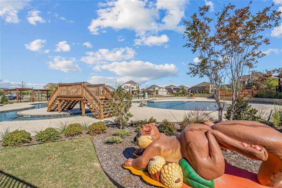 Outdoor pool with stairs, a patio, and a residential view Outdoor pool with stairs, a patio, and a residential view
