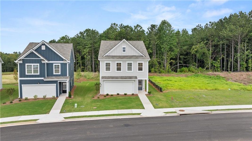 Front exterior of a new home in Walden Park – The Retreat, Jonesboro, GA, highlighting curb appeal (Image 24).