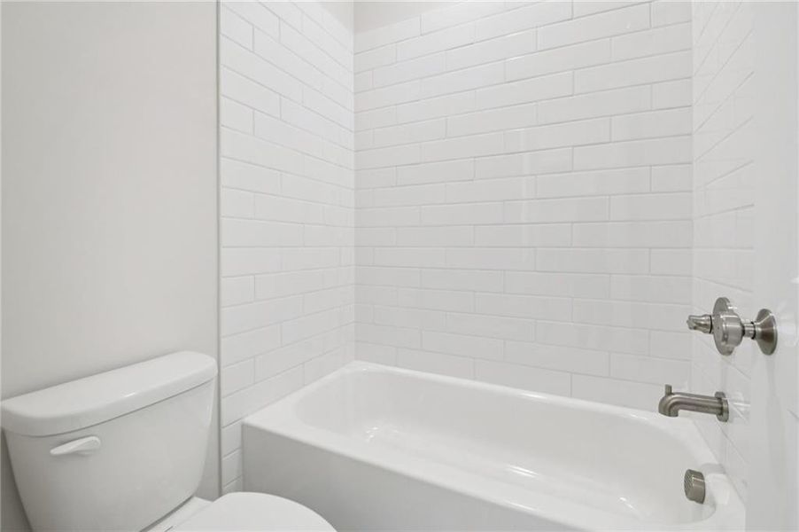 Furnished interior view inside a new home in Ward's Crossing Townhomes, Johns Creek (Image 6).