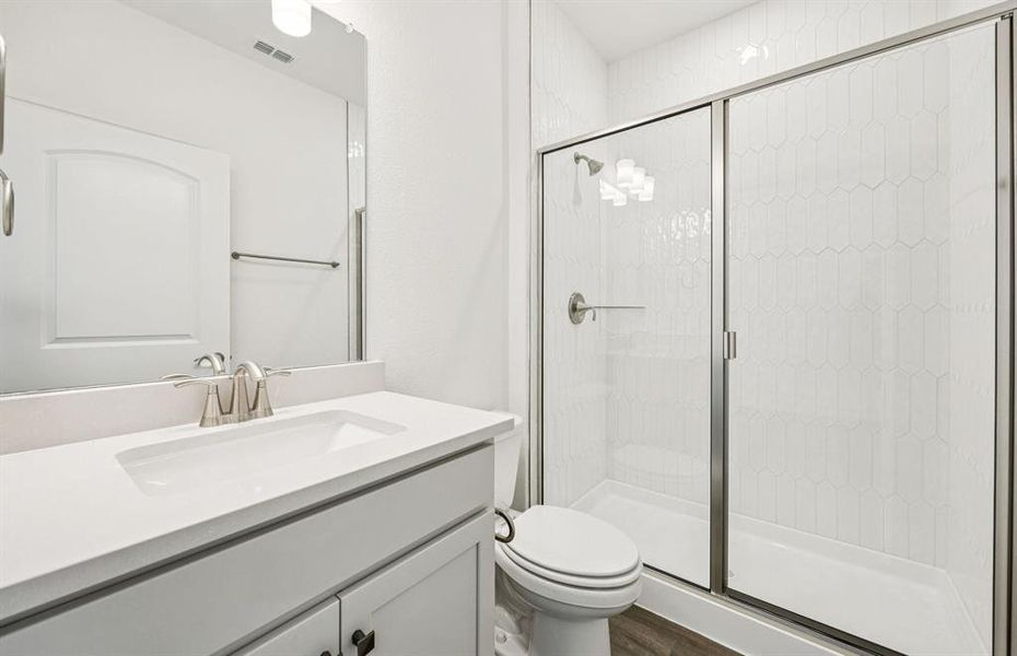 Upgraded secondary bath with elegant finishes *Real home pictured Upgraded secondary bath with elegant finishes *Real home pictured