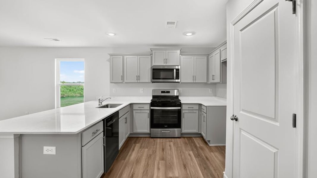 Furnished interior view inside a new home in Tyger Pines, Moore (Image 7).