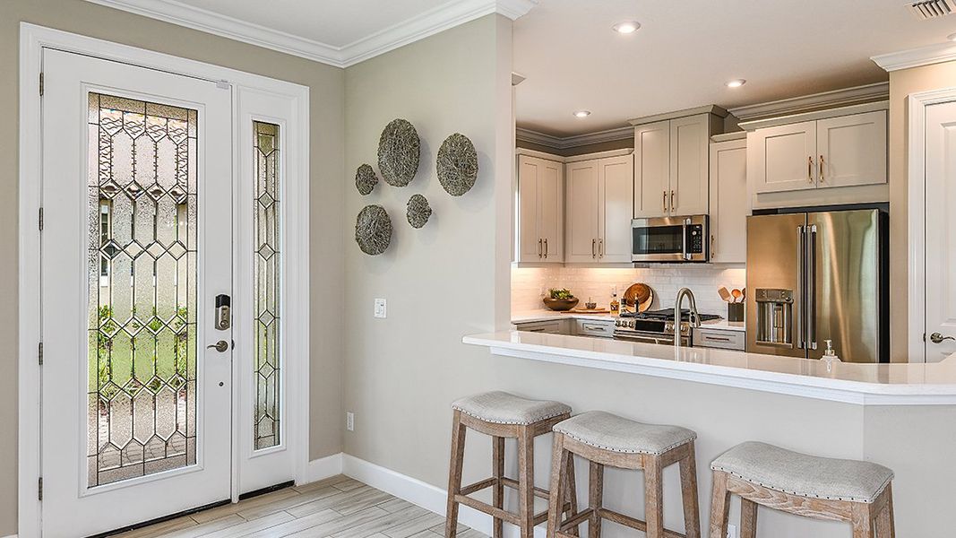 Representative furnished interior of a home built from the Roma by Taylor Morrison in Esplanade at Azario Lakewood Ranch, Lakewood Ranch (Image 20).