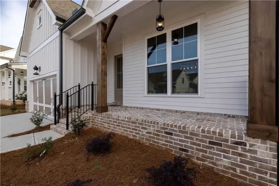 Exterior details and patio area of a home in Aberdeen, Hoschton (Image 29).